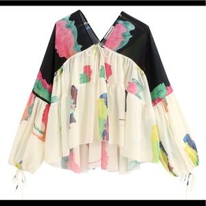 Large 8-10 woman’s BOHO blouse.